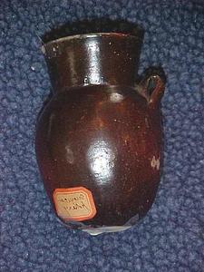 Mexican redware pottery creamer