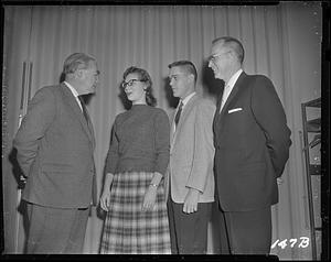 President Glenn Olds with students and other man