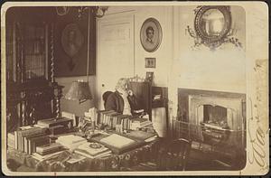 Henry Wadsworth Longfellow in his study