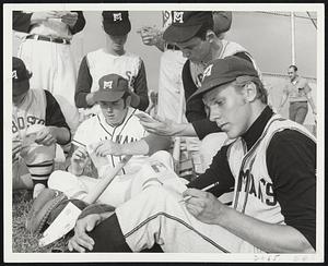 Stars of Tomorrow - Paul Costello, center and Jerry Smith, right, members of South Boston Connie Mack League, punch out choices for this year's major league All-Star teams, made available by Gillette Co.