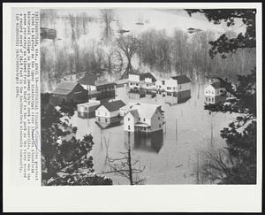 Historical Village Flooded--The greatest flood in history on the Upper Mississippi river inundates Stonefield historical village in Nelson Dewey State Park at Cassville. This was the scene yesterday was viewed from a bluff in the park as the river neared a record crest of 24.5 feet in the Southwestern Wisconsin community.