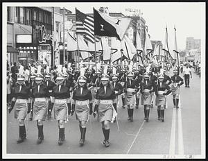 Imperials of Pembroke march in parade held in honor of the flag in Cambridge last night. Parade was co-sponsored by the City of Cambridge and Cambridge Lodge of Elks.