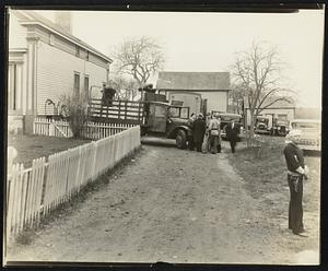 A Rum Raid and Three Arrested Were Made Here. Police found 240 cans of untaxed Alcohol on a truck and 200 cans in the cellar of this quiet appearing South Dartmouth Farm House, said to be the residence of Victor Mederios, 151 Russel's Mills Road.