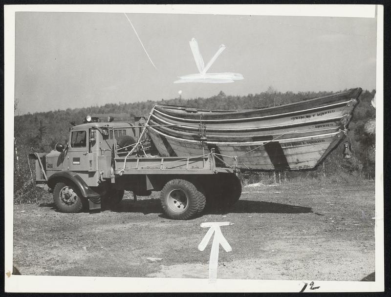 Dories from Gloucester fishing schooner Gertrude L. Thebaud being rushed by truck for relief work in the western part of the state.