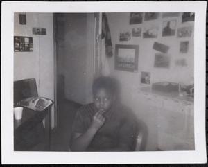 Boy sitting and looking thoughtful