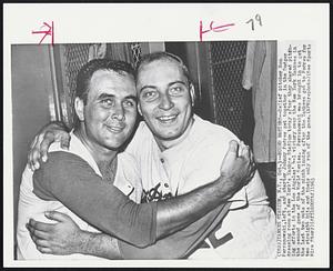 Mound Masters--Relief pitcher Ron Perranoski ,left, and starter Johnny Podres get together in the Dodger dressing room at New York’s Yankee Stadium today after they shared pitching efforts in the Los Angeles’ 4-1 victory over the New York Yankees in the second game of the World Series. Perranoski was brought in to get the last two outs of the ninth inning after the Yankees got to Podres for two straight hits and their only run of the game.