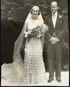 Descendant of Two Presidents Weds. Mr. and Mrs. Charles Francis Adams, Jr., after their marriage at Beverly Farms, Mass., June 16. Mr. Adams is the son of Charles Francis Adams, former Secretary of the Navy, and a direct descendant of the second and sixth presidents of the United States. His bride is the former Miss Margaret Stockton, daughter of Philip Stockton, Boston banker.