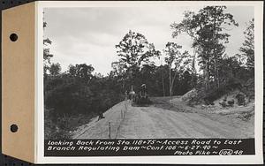 Contract No. 106, Improvement of Access Roads, Middle and East Branch Regulating Dams, and Quabbin Reservoir Area, Hardwick, Petersham, New Salem, Belchertown, looking back from Sta. 118+75, access road to East Branch Regulating Dam, Belchertown, Mass., Jun. 27, 1940