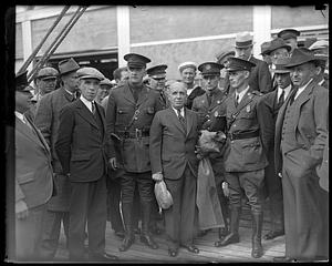 An unidentified group of people, some in military uniform