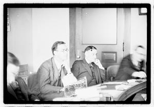 Group of men at table