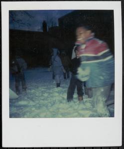 Children standing in the snow