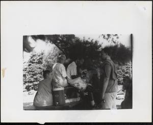 Group of young people on a picnic table
