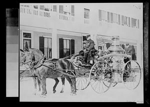 Horse-drawn fire truck in front of Old Natick Inn, S. Natick