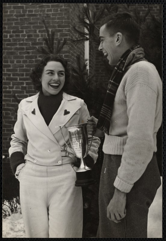 Florence Allen of Burmingham, Alabama Queen of Carnival presenting Joseph Fogarty and the Delta Tau Delta fraternity the cup for the prize winning snow statue.