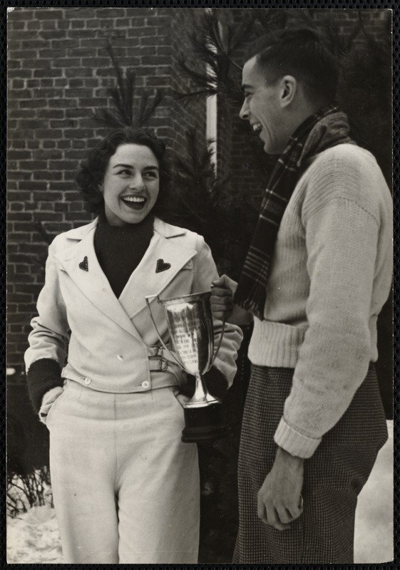 Florence Allen of Burmingham, Alabama Queen of Carnival presenting Joseph Fogarty and the Delta Tau Delta fraternity the cup for the prize winning snow statue.