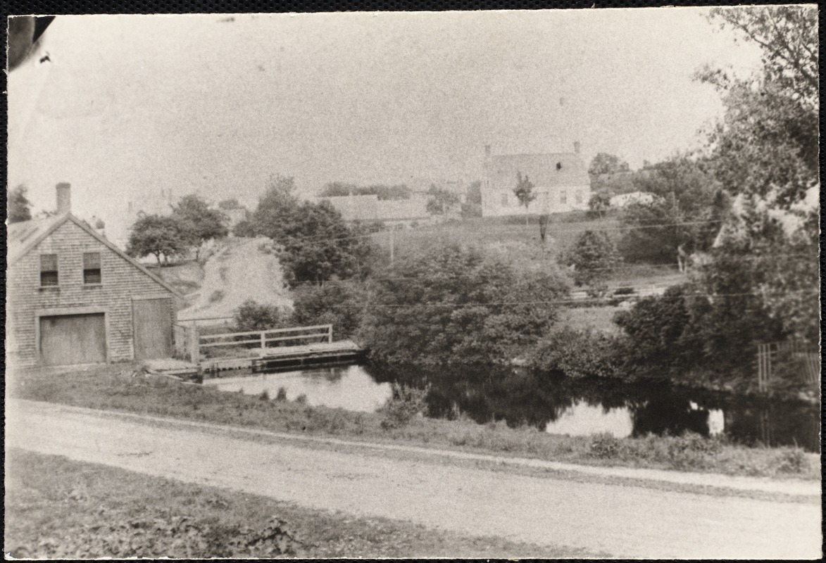 The old center factory and the falls and the roof of the carpenter shop can be seen through the trees on the right, used by the Weymouth Iron Co. many years ago