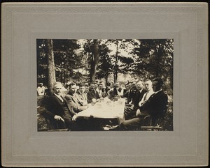Lenox Fire Department: men seated around picnic table