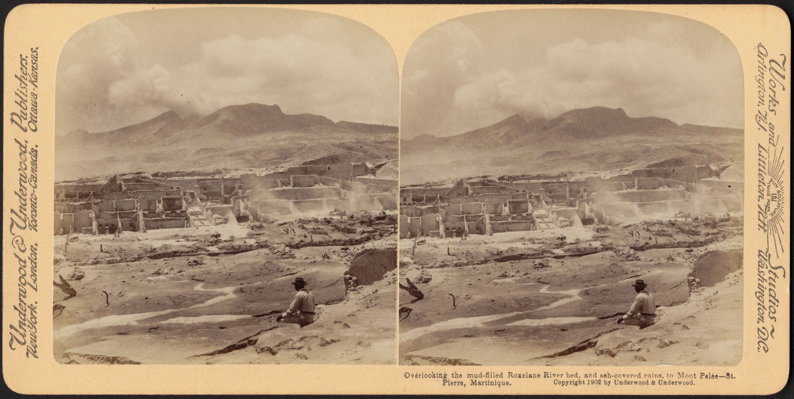 Overlooking the mud-filled Roxelane River bed, and ash-covered ruins, to Mont Pelée - St. Pierre, Martinique