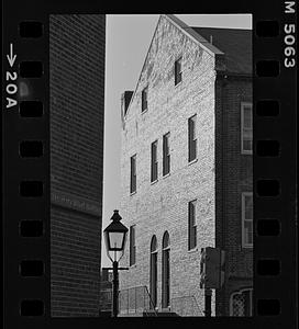 Lamppost and brick building