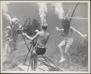 Diver underwater during the shooting of a training film on deep sea diving at Silver Springs, Fla.