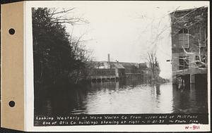 Looking westerly at Ware Woolen Co. from upper end of mill pond, one of Otis Co. buildings shown at right, Ware, Mass., Nov. 21, 1935