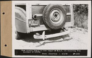 View showing damage to rear bumper of M.D.C. 101 resulting from accident of 8/2/48, Barre, Mass., Aug. 3, 1948