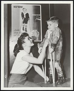 When Debby met Debbie it was neither a mixup in names nor a Hollywood scenario writer’s dream. It was simple Debby Dains, 1954 March of Dimes Poster Boy, meeting Debbie Reynolds, RKA-Radio’s star of “Susan Slept Here” on the lad’s recent visit to movieland. A visit to Miss Reynolds’ dressing room, the dream of many a starry-eyed fan, didn’t upset the four-year-old trouper from Gooding, Idaho. After all, he too was a celebrity making personal appearances as part of his contribution to the anti-polio fund raising campaign during January.