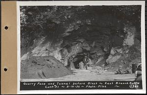 Contract No. 51, East Branch Baffle, Site of Quabbin Reservoir, Greenwich, Hardwick, quarry face and tunnel before blast, Hardwick, Mass., Sep. 16, 1936