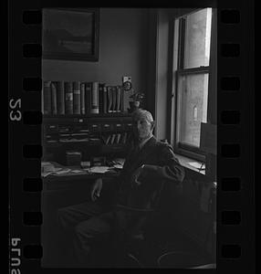 Unidentified man sitting at desk