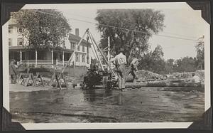 Laying pipe across the State Road