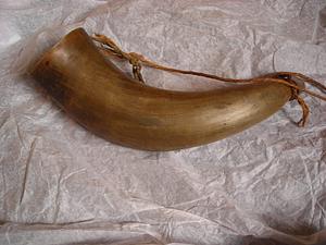 Powder horn with attached cord