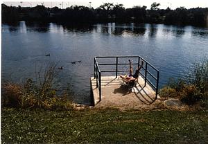 Man Sunbathing by The Charles River