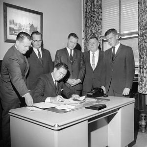 George O'Hara & Mayor Edward J. Harrington Signing 99 year lease, City Hall, New Bedford