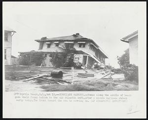 Hurricane Washout.-Homes along the middle of beach gave their found dation to the old Atlantic here, after a severe hurricane struck early today. The front toward the sea is caving in.