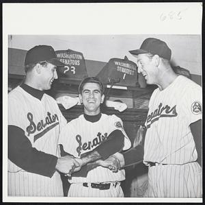 Top in Strikeouts in the American League is Camilo Pascual of the Washington Senators. He's shown with Outfielder Bob Allison (left) who had a single, homerun, double and a walk, and Jim Lemon (right) who singled and homered in last night's 8-1 victory over the Athletics in Washington. Pascual allowed only three hits and stuck out 11 to bring his SO total to 42.