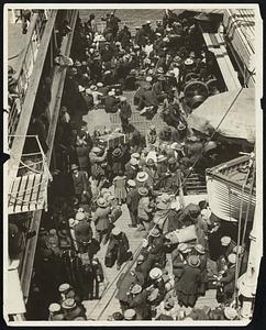 A portion of the "July Quota". First arrivals of the month await the signal allowing them to land at this port from the Adriatic.