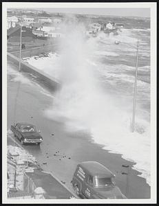 Storm surge over coastal street