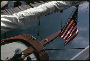 Closeup of a flag hanging from a boat