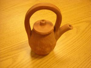 Miniature Jamaican vessel with spout, handle and lid