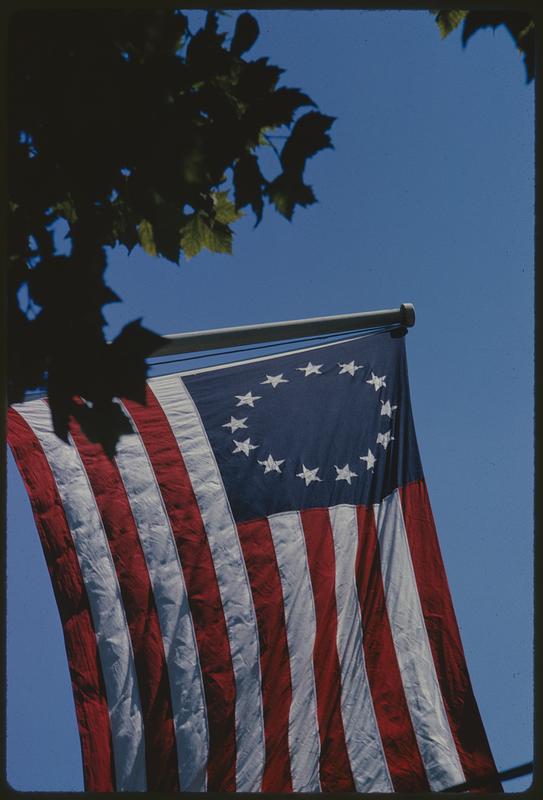 Betsy Ross flag flying, likely Philadelphia