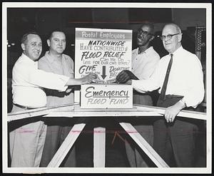 Help From Postal Workers -Employes at the South Postal Annex are contributing to the Red Cross flood relief fund. Left to right are James Constantine, Cambridge; Stanley Wysocki, Dorchester; Otis E, Galloway, Roxbury, and H. D. Bennet, superintendent of outgoing mail.