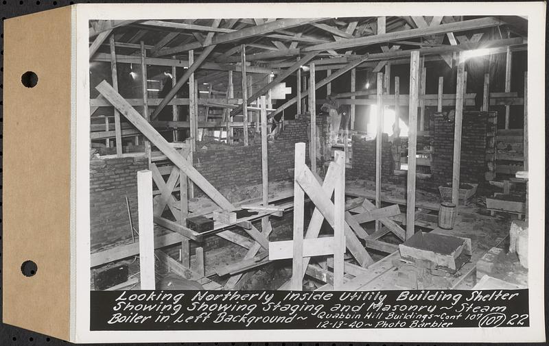 Contract No. 107, Quabbin Hill Recreation Buildings and Road, Ware, looking northerly inside utility building shelter showing staging and masonry, steam boiler in left background, Ware, Mass., Dec. 13, 1940