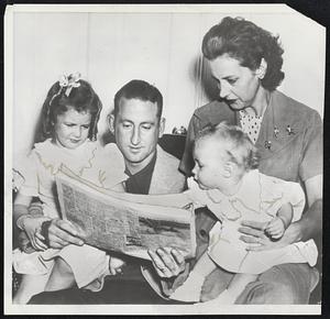 Boston, Here We Come was the shout of this group when they read that Papa had been traded to the Red Sox. Pitcher Ray Scarborough and family are shown at their home in Mt. Olive, N. C. The former Chicago White Sox hurler is being assisted in reading the news by his wife, Edna, and daughters Beverly (left) and Shirley.
