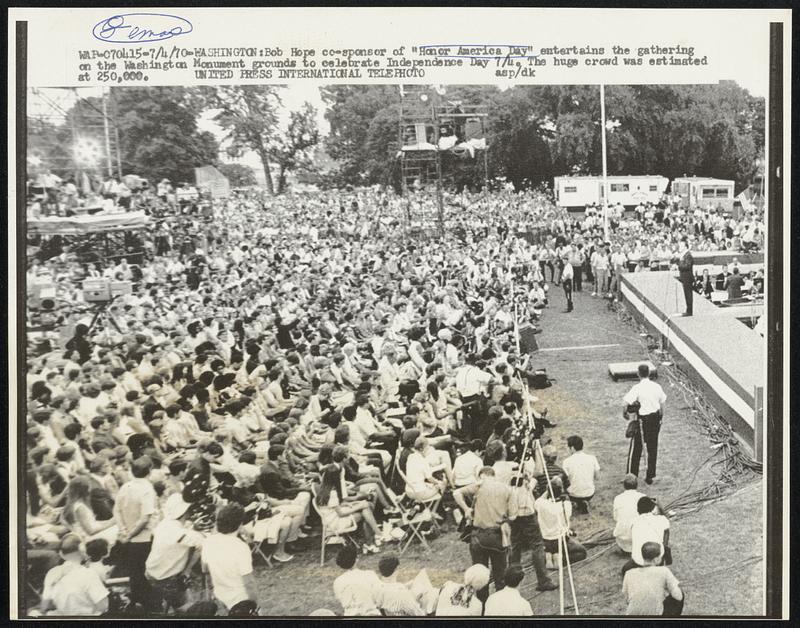 Washington: Bob Hope co-sponsor of "Honor America Day" entertains the gathering on the Washington Monument grounds to celebrate Independence Day 7/4. The huge crowd was estimated at 250,000.