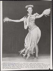 Wins first-round talent competition