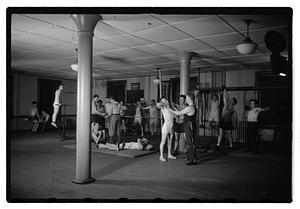 Men exercising in a gym