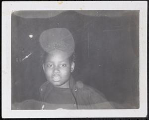 Young person looking at photographer