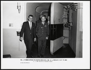 Mr. J. O'Connor entering the reactor during Brig. Gen. W. G. Merriam's visit to AMRA