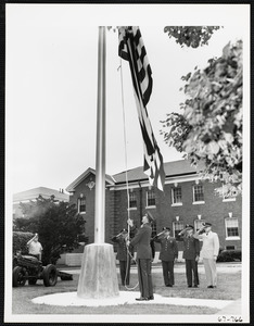 Men saluting flag