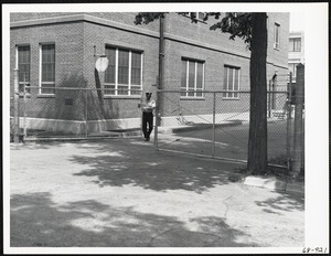 Officer opening gate